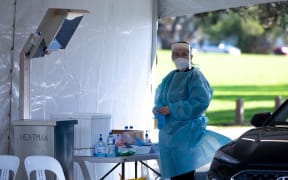 A health worker at the Devonport Covid-19 testing station.