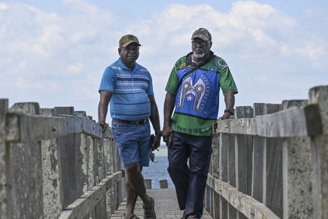 Pabai Pabai (L) and Paul Kabai (R) filed a landmark lawsuit aimed at forcing the government to protect them from climate change through deeper cuts to carbon emissions.