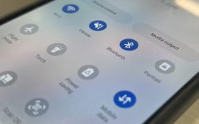 Bluetooth symbol on smartphone screen