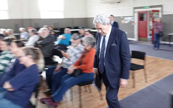 Winston Peters strides to the stage in front of about 200 people in Levin on Friday.