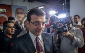 Ekrem Imamoglu, candidate of the secular opposition Republican People's Party (CHP), arrives to make his victory speech.