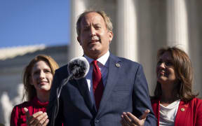 WASHINGTON, DC - NOVEMBER 01: Texas Attorney General Ken Paxton speaks outside the U.S. Supreme Court on November 01, 2021 in Washington, DC. On Monday, the Supreme Court heard arguments in a challenge to the controversial Texas abortion law which bans abortions after 6 weeks.   Drew Angerer/Getty Images/AFP (Photo by Drew Angerer / GETTY IMAGES NORTH AMERICA / Getty Images via AFP)
