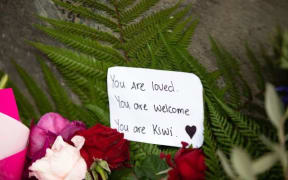 A message left on the wall outside the Christchurch Botanical Gardens.
