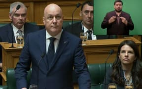 PM Christopher Luxon as the apology was disrupted by shouting in Parliament.