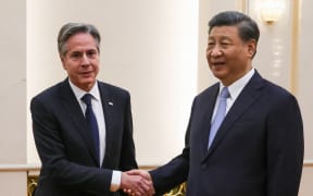 US Secretary of State Antony Blinken (L) shakes hands with China's President Xi Jinping at the Great Hall of the People in Beijing on June 19, 2023. President Xi Jinping hosted Antony Blinken for talks in Beijing on June 19, capping two days of high-level talks by the US secretary of state with Chinese officials. (Photo by Leah MILLIS / POOL / AFP)