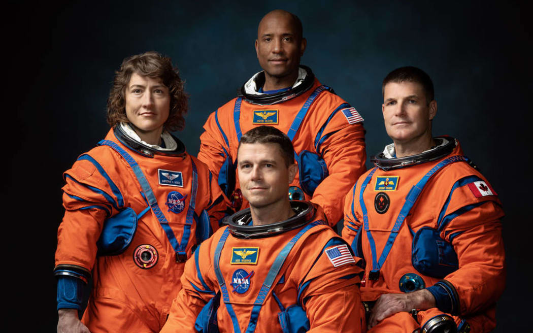 PHOTO DATE: March 29, 2023. LOCATION: Bldg. 8, Room 183 - Photo Studio. SUBJECT: Official crew portrait for Artemis II, from left: NASA Astronauts Christina Koch, Victor Glover, Reid Wiseman, Canadian Space Agency Astronaut Jeremy Hansen. PHOTOGRAPHER: Josh Valcarcel