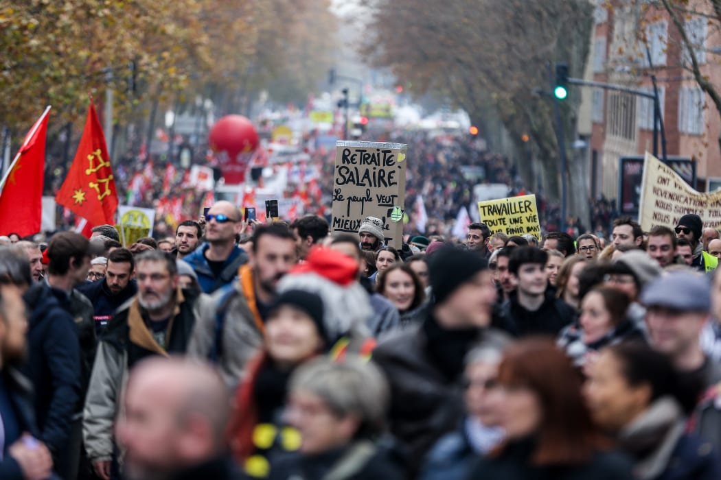 Protesters against the pension reform planned by Edouard Phillipe's government in downtown Toulouse. According to an initial assessment, the event brought together 100,000 people according to the unions, 33,000 people according to the prefecture of Haute Garonne. December 5, 2019, Toulouse, France.