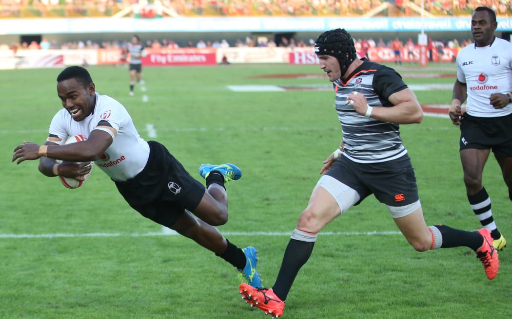 Waisea Nacuqu dives over for a try during the 2016 Dubai Sevens.