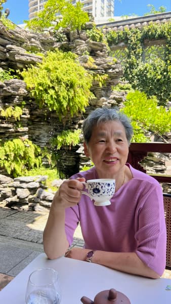 Shujie Yang had to leave behind a precious chopping board made by her father.