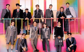 K-pop band Seventeen, with members S Coups, Jeonghan, Joshua, Jun, Hoshi, Wonwoo, Woozi, DK, Mingyu, The8, Seungkwan, Vernon and Dino.