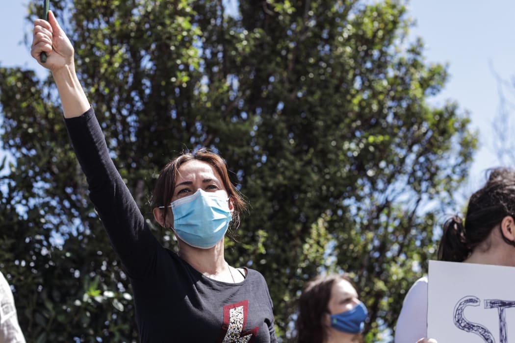 Protestor Lana shouts out to the crowd.