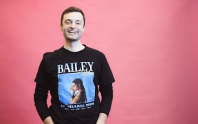 Host of RNZ podcast The Detail, Alex Ashton in his Bailey Wiley t-shirt