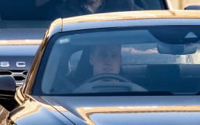 Prince William, Prince of Wales, drives himself away from the London Clinic in London on 18 January, 2024 where his wife Catherine, Princess of Wales, underwent surgery.