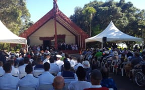 Congregation gathers for church service on Treaty Grounds.