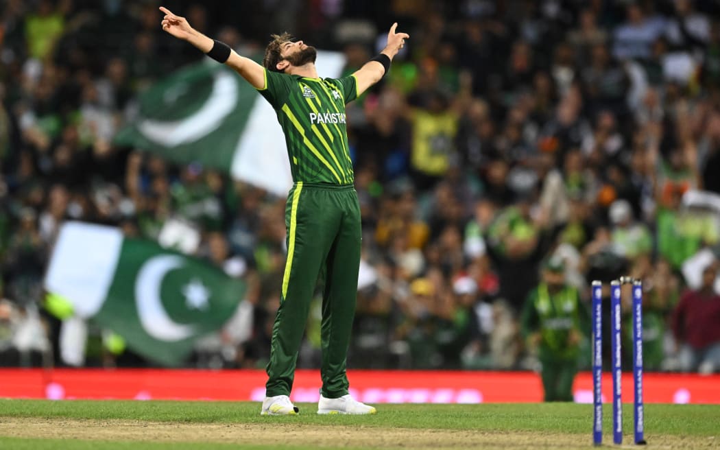 Shaheen Afridi celebrates the wicket of Black Caps skipper Kane Williamson in the T20 Cricket World Cup semi-final.

\