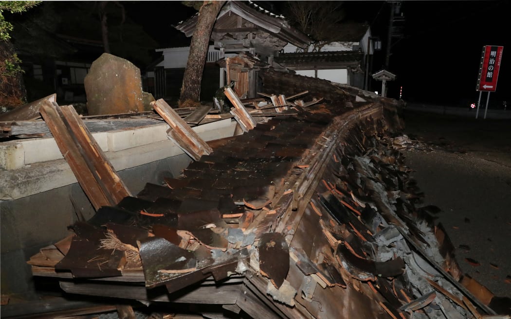 A tile roof exterior wall of historic old house is destroyed by a massive earthquake in Nanao City, Ishikawa Prefecture on January 1, 2024 after a massive earthquake struck the region.