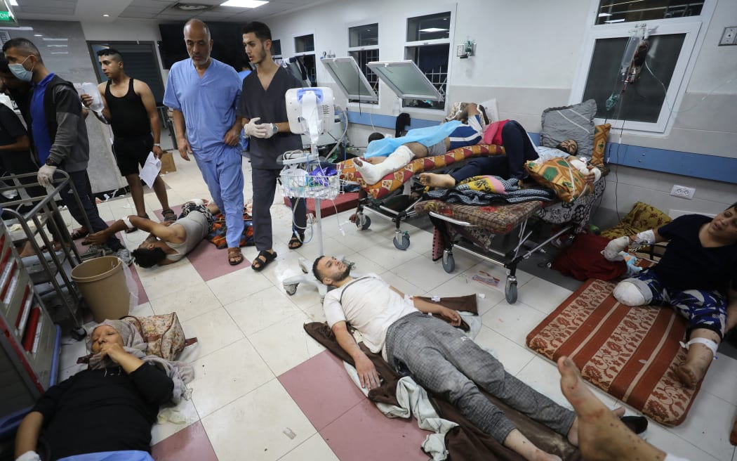 Injured Palestinians receive treatment at the Al-Shifa hospital in Gaza City on 7 November, 2023, amid ongoing battles between Israel and the Palestinian Hamas movement.