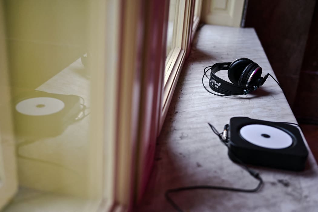 Headphones are lying on the windowsill at the House of Sound in Lviv, Ukraine, on December 16, 2023. The House of Sound is a special space where the employees of Lviv Radio are working with various types of sound and music. Additionally, they are holding educational projects, audio performances, and sound plays there. NO USE RUSSIA. NO USE BELARUS. (Photo by Ukrinform/NurPhoto) (Photo by Anastasiia Smolienko / NurPhoto / NurPhoto via AFP)