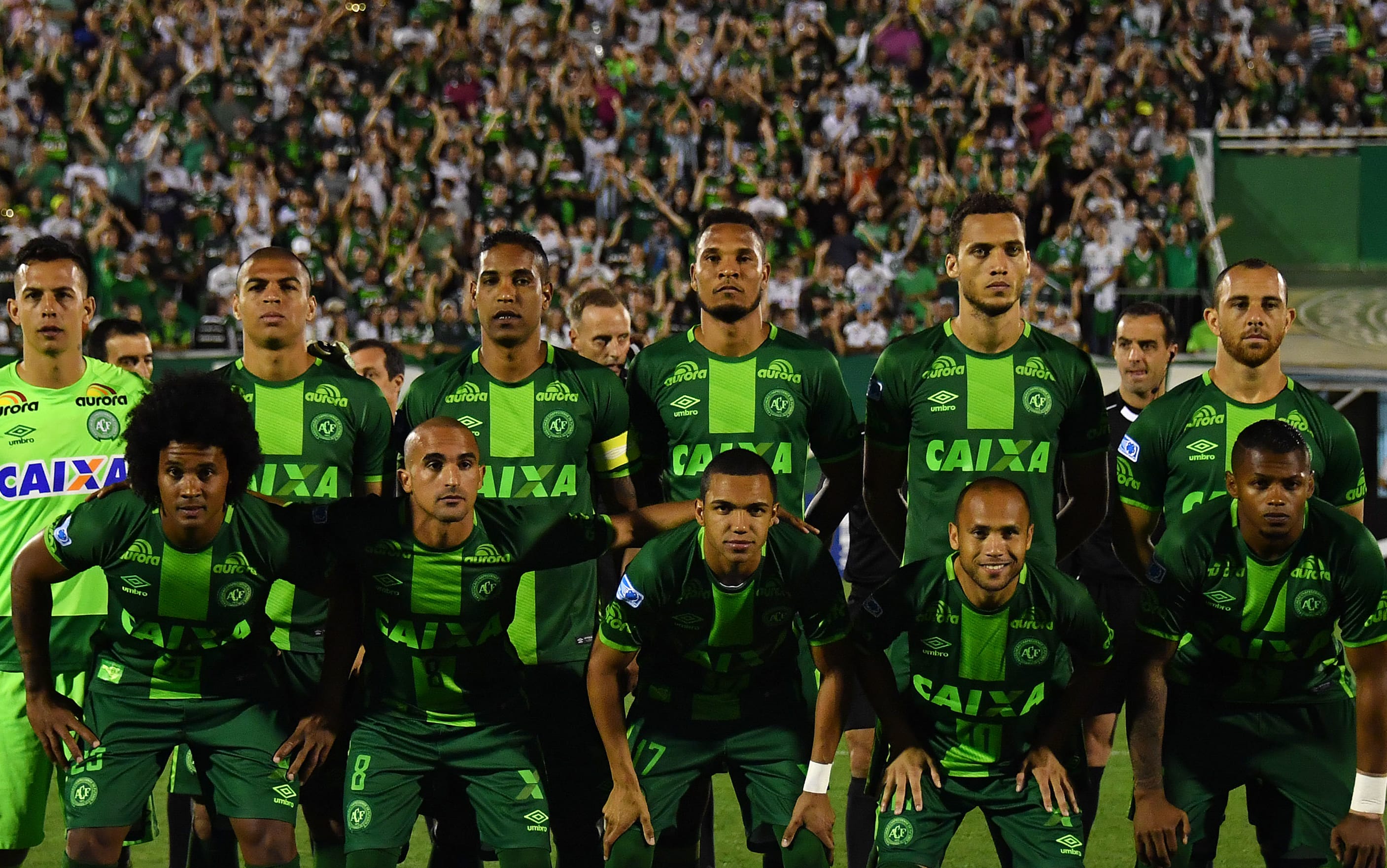 This file photo taken on November 24, 2016 shows Brazil's Chapecoense players posing for pictures during their 2016 Copa Sudamericana semifinal second leg football match against Argentina's San Lorenzo held at Arena Conda stadium, in Chapeco, Brazil.