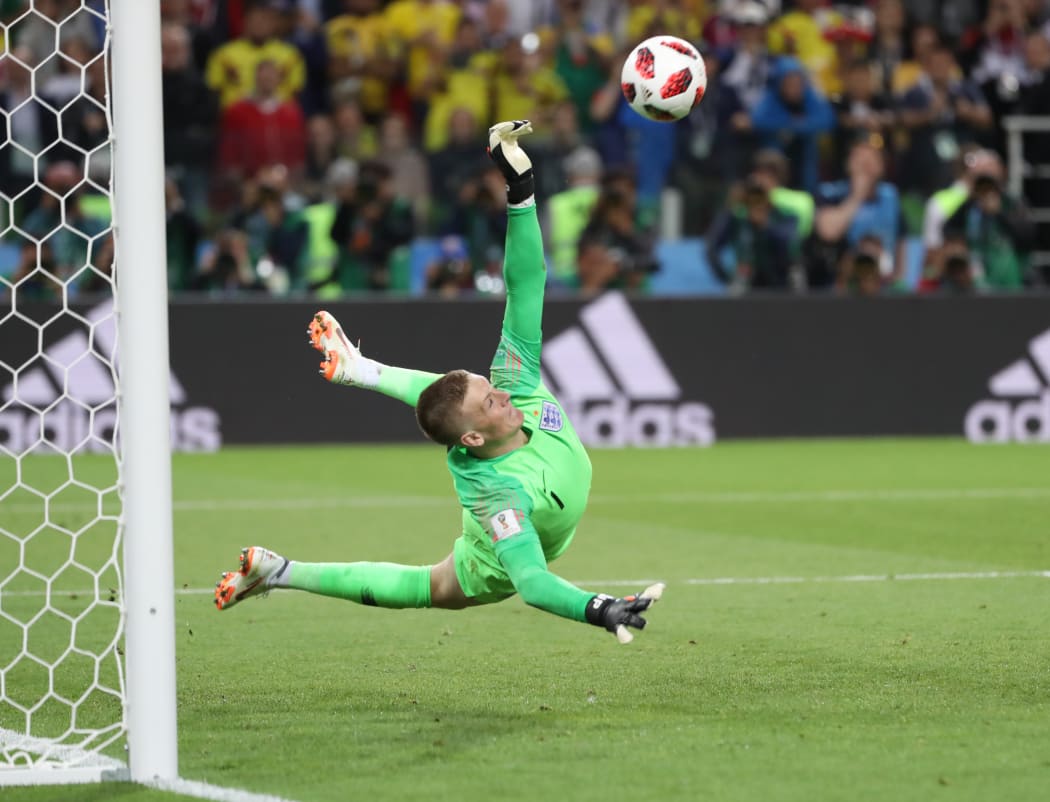 Englands Goalkeeper Jordan Pickford stops Colombia's Carlos Bacca's kick in a penalty shootout.
