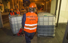 Greenpeace has dumped 6000 litres of cow urine and other dairy waste at the ACC's old Wellington head office.
