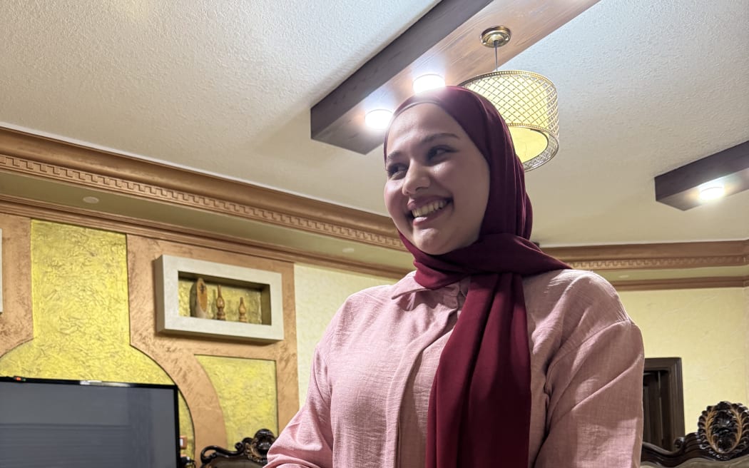 Dan Nawafleh serving up Jordanian sweets at mealtime.