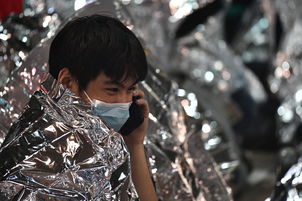 Unwell and injured protesters wait for medics at Hong Kong Polytechnic University in the Hung Hom district of Hong Kong on 19 November 2019.