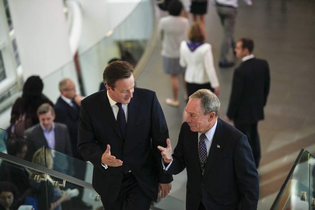 David Cameron shares a few words with Michael Bloomberg, founder of Bloomberg LP, at the company's headquarters in New York.
