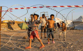 The Covid-19 quarantine area with fences made of barbed wire for the Coronavirus positive cases in the new refugee camp in Kara Tepe - Mavrovouni a former military area, shooting range of the Hellenic Army, near Mytilene city in Lesbos island Greece.