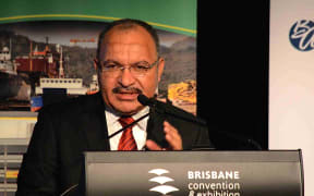 Papua New Guinea PM Peter O'Neill addresses the PNG Investment Summit in Brisbane.
