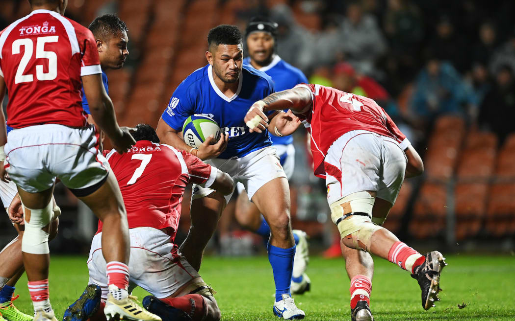 A close up picture of an attempted tackle during the international rugby union test match between Manu Samoa v Tonga in Hamilton July 2021.
