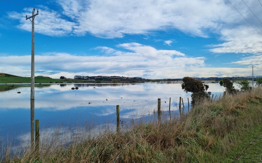 Floodwaters lingering in Clutha fields.