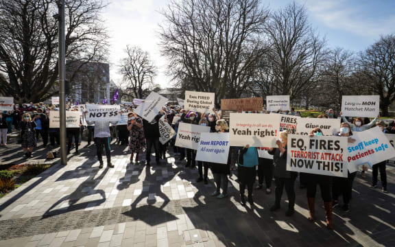Hundreds of protesters gather outside of the CHB corporate office.