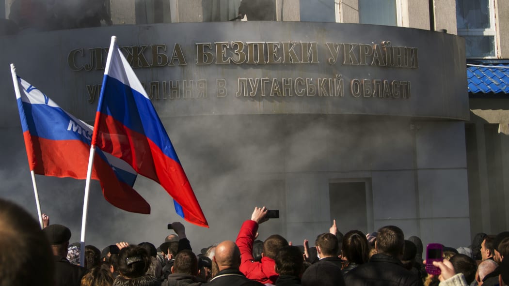 Pro-Russian activists in front of the regional security service in Lugansk.