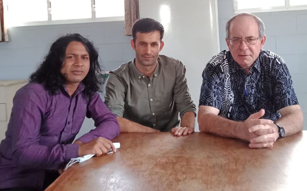 Fr. Giorgio Licini (right) with [https://www.rnz.co.nz/international/pacific-news/414846/manus-island-asylum-seeker-wins-right-to-stay-in-png Helal Uddin] and a refugee stranded in Port Moresby.