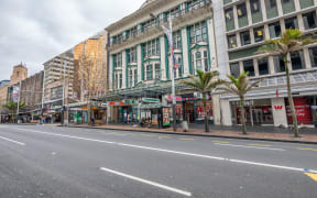 AUCKLAND, NEW ZEALAND - AUGUST 26, 2018: Queen Street buildings on a sunny winter day. The city attracts 2 million tourists annually.