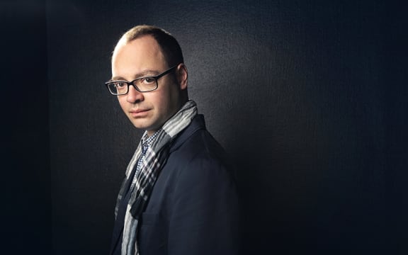 Headshot of Russian pianist Alexander Melnikov