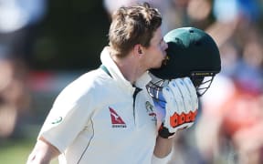 Steve Smith celebrates his century.