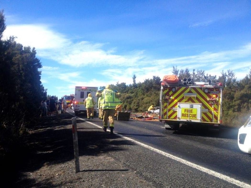 Police attending the serious crash on Desert Road.