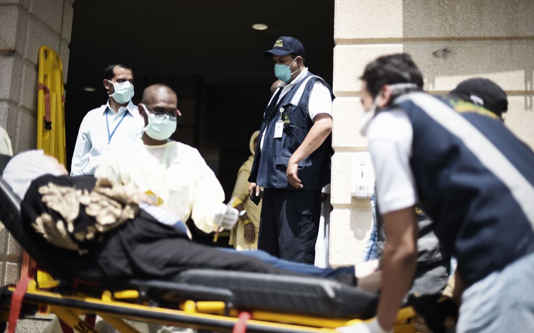 Saudi medics tend to injured pilgrims.