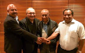 Bonding time: Powes Parkop (Leader of the Social Democratic Party), Peter O’Neill (Leader, of the People’s National Congress Party), Sir Julius Chan (of the People's Progress Party) and William Duma (Leader of the United Resources Party).