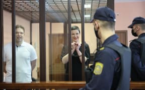 Belarusian opposition activists Maxim Znak (L) and Maria Kolesnikova (2nd L), who are members of the Presidium of the oppositions Coordination Council, appear for a sentencing hearing at the Minsk Region Court in Minsk, Belarus on September 06, 2021.