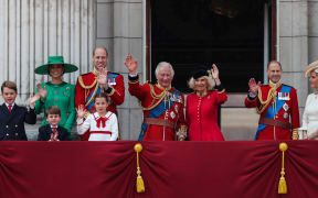 (L-R) Britain's Prince George of Wales, Britain's Catherine, Princess of Wales, Britain's Prince Louis of Wales, Britain's Prince William, Prince of Wales, Britain's Princess Charlotte of Wales, Britain's King Charles III, Britain's Queen Camilla, Britain's Prince Edward, Duke of Edinburgh and Britain's Sophie, Duchess of Edinburgh wave from the balcony of Buckingham Palace after attending the King's Birthday Parade, 'Trooping the Colour', in London on June 17, 2023. The ceremony of Trooping the Colour is believed to have first been performed during the reign of King Charles II. Since 1748, the Trooping of the Colour has marked the official birthday of the British Sovereign. Over 1500 parading soldiers and almost 300 horses take part in the event. (Photo by Adrian DENNIS / AFP)