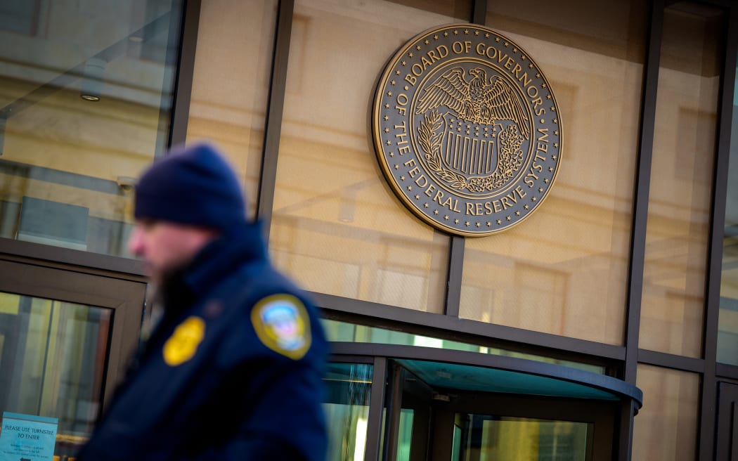 WASHINGTON, DC - DECEMBER 9: The Federal Reserve logo is visible on the William McChesney Martin Jr. Building on December 9, 2025 in Washington, DC. The Federal Open Market Committee (FOMC), the policy-making arm of the Federal Reserve, starts its two-day meeting today and will release its interest rate decision and policy statement tomorrow.   Andrew Harnik/Getty Images/AFP (Photo by Andrew Harnik / GETTY IMAGES NORTH AMERICA / Getty Images via AFP)