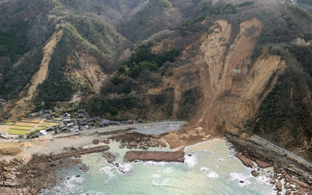 An aerial photo shows Nie Town isolated by landslides in Suzu City, Ishikawa Prefecture on 4 January, 2024 after a strong earthquake struck Japan's Noto region on New Year's Day.