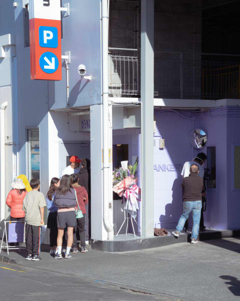 Picture of the Fankery brick-and-mortar store. The store is painted in purple. An old carpark ticketing booth has been repurposed to the brick-and-mortar store.