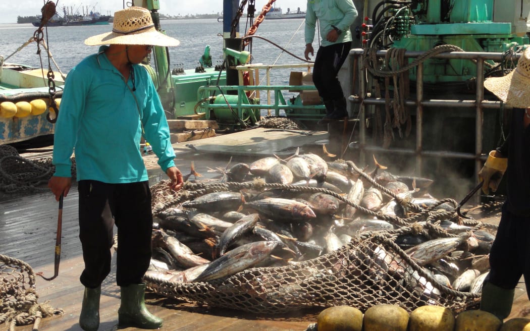 A Marshall Islands-flagged vessel is in the process of transshipping its tuna catch to canneries in different parts of the world