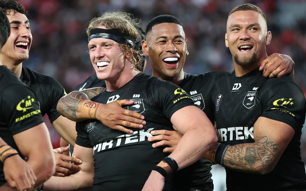 The Kiwis celebrate  Phoenix Crossland of the Kiwis try (C) during New Zealand Kiwis v Tonga XIII, round 3 of the Pacific Championships at Eden Park.