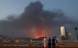 Black smoke ascends following an explosion in the Fujairah industrial zone.