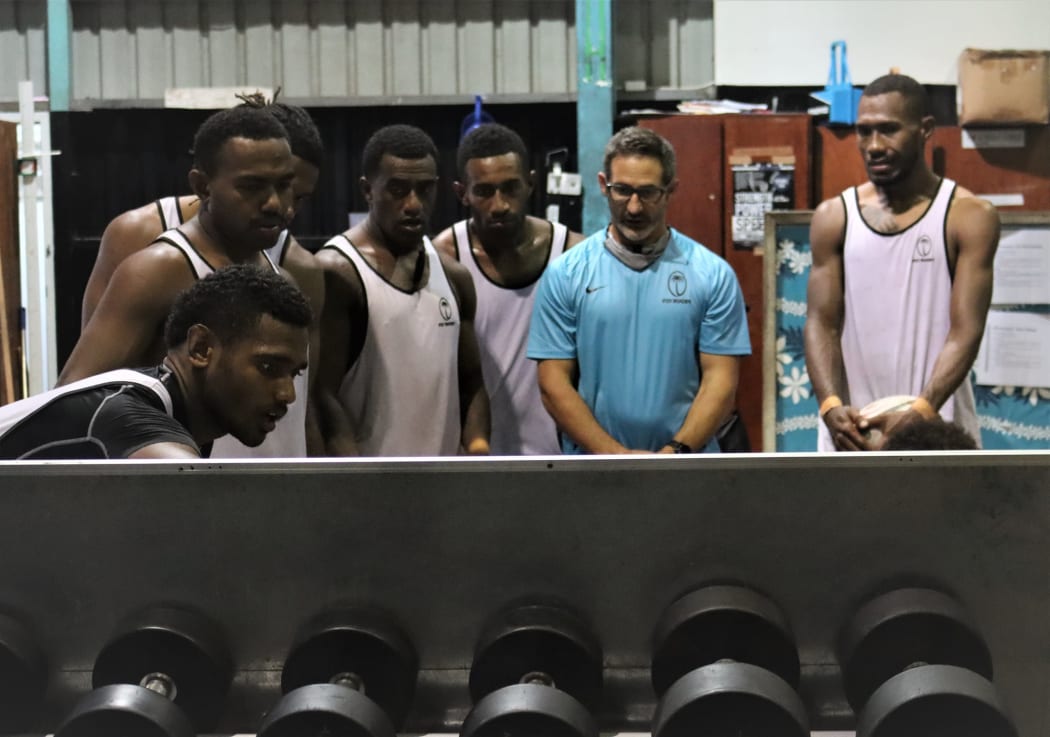 Fiji 7s coach Ben Gollings in the gym with some of the national squad.